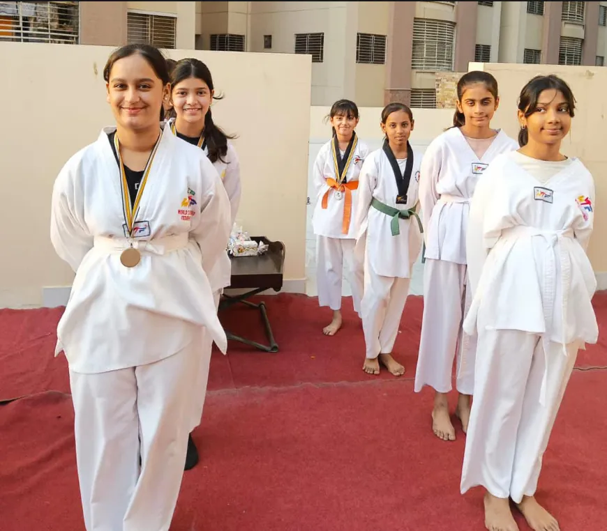Unity Taekwondo Academy students with their tournament medals